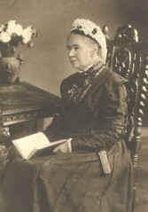 Alcock, Debora